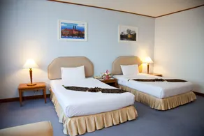 Thumrin Thana Hotel - Chambre