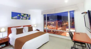 122 Plaza Apartahotel - Chambre
