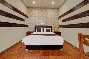 Capital O 92276 Hotel Pesona Gunung - Habitación