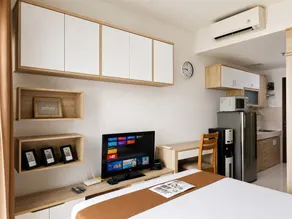 Bright Studio Apartment at Springwood Residence - Værelse