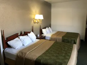 Posh Inn & Suites - Værelse