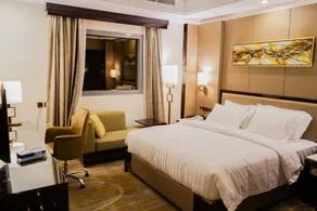 Al Ertiqaa Hotel - Room