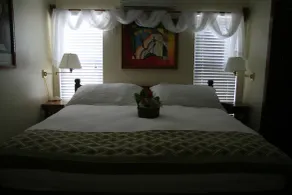 The Palms Oceanfront Suites - Room