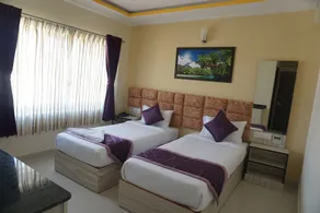 Zenith Suites - Quarto