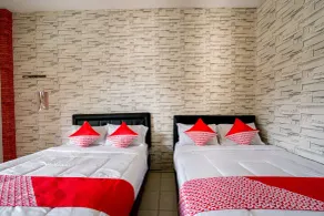 Super OYO 2961 Artana Bed & Breakfast - Zimmer