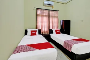 Hotel O Unram Guest House - Chambre