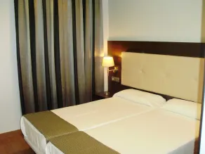 Apartamentos Boutique Catedral - Chambre