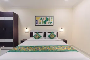Treebo SNS Grand Inn With Swimming Pool - Room