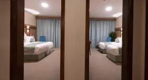 Sukoon Hotel - Zimmer