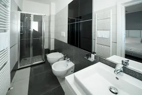Atmosphere Suite Hotel - Badezimmer
