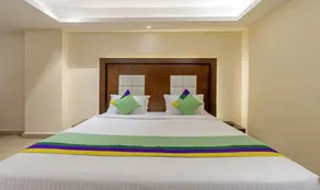 Treebo Suvarna Comforts - Room