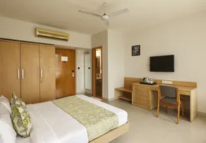 Mango Suites Select Mahape - Chambre