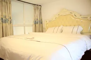Wanlong Apartment Xiangxue Branch - Værelse