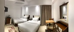 Maxim Hotel - Chambre
