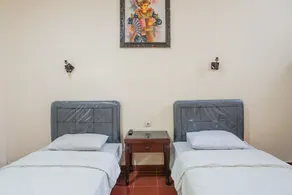 RedDoorz at Mahendra Beach Inn Kuta - Room