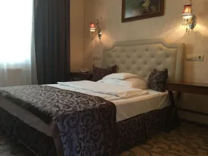 Hotel Capitulum - Habitación