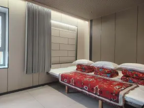 Xuegu Xinfu Guest House - Chambre