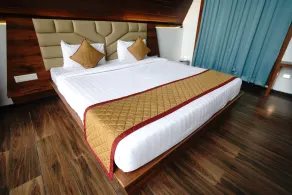 Q Mango Resort - Zimmer