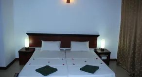 The Coconut Gardens Hotel & Restaurant - Chambre