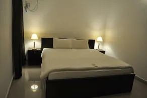 Jyothi Suites - Chambre