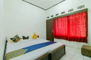 OYO 1707 Hotel Mustika Widyasari - Chambre
