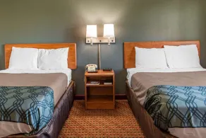 Travelers Lodge & Suites - Zimmer