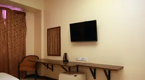 Miico Hotel Permas Jaya - Chambre