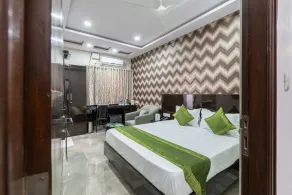 Treebo Greenwood Premier Suites, Old Airport Road - Chambre