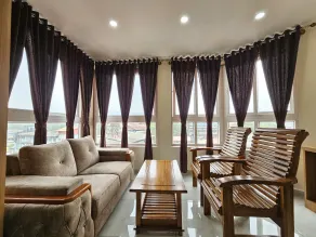Navarathna Comforts - Vue de la chambre