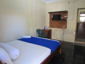 Hotel Family Syariah 1 Parangtritis RedPartner - Room