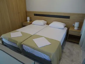 Cosmos Apartments - Værelse