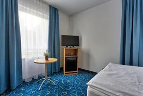 Appartis - Hotel am Stadtpark - Chambre