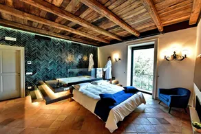 In Costa Relais & Luxury Suites - Zimmer