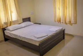 Ganesh Home Stays - Chambre