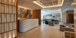 THE GRAND HOTEL GINOWAN - Rezeption