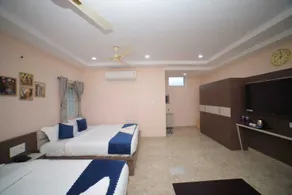 Sri Ganesh Grand - Chambre