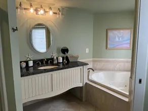 Hear the Ocean from this well kept oceanside duplex - Image 3