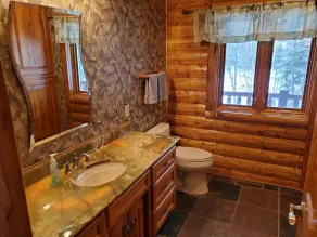 Lakefront secluded mult-family retreat with game room and two cabins. - Image 5