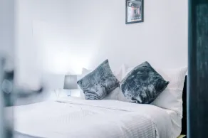 65 Inch TV & Luxurious 2 Bedroom Suite for Your Ultimate Getaway - Image 4
