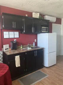Private Studio with private entrance includes driveway parking space. - Image 4