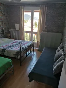Family room in the mountains close to the lake and town center - Image 4