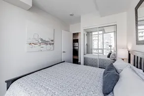 Elegant Downtown Oasis with City and Lake Views Plus Parking! - Image 5