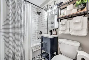 Welcome to The Steele Magnolia!! Completely renovated 2 bed/1ba plus bonus pull out futon couch. We are located directly across the street from Von Stiehl Winery and are just a few minutes walk to Crescent Beach! - Image 2