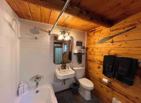 Iconic Log Cabin w/ Wood Burning Hot Tub and Epic Views - Image 4