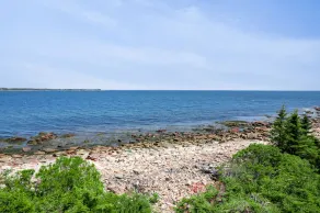 Take in the breathtaking views at our popular oceanside cottage with large deck. - Image 5