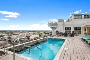 Rooftop Radiance: Modern Elegance in 1BR Condo with BBQ Area - Image 3