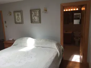 Maison privée entourée de 180 acres de forêt sur le port d'Otter, au Cap-Breton - Image 4