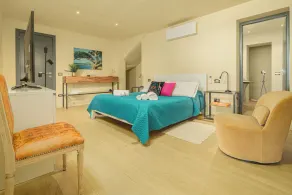 PORTO CERVO • DESIGN UND KOMFORT MIT ERSTAUNLICHEM BLICK AUF PEVERO BAY - Image 4