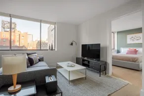 Bright Chelsea 1BR w/ Roofdeck, Doorman, BBQ, by Blueground - Image 3