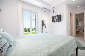 The apartment has a terrace with a panoramic view of the Aegean Sea and Paros. - Image 4